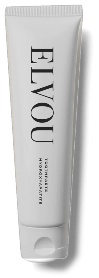 A white tube of Elvou hydroxyapatite toothpaste